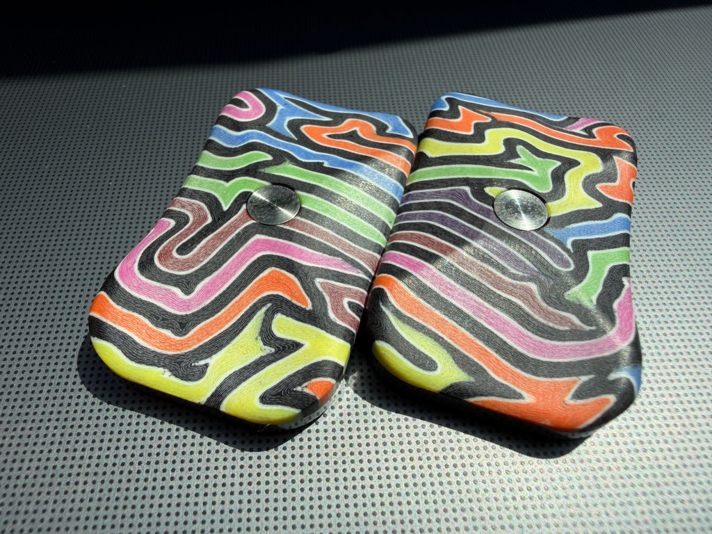 ErgoBoy - Wacky Wavy G10 with SS Tortoise Plates